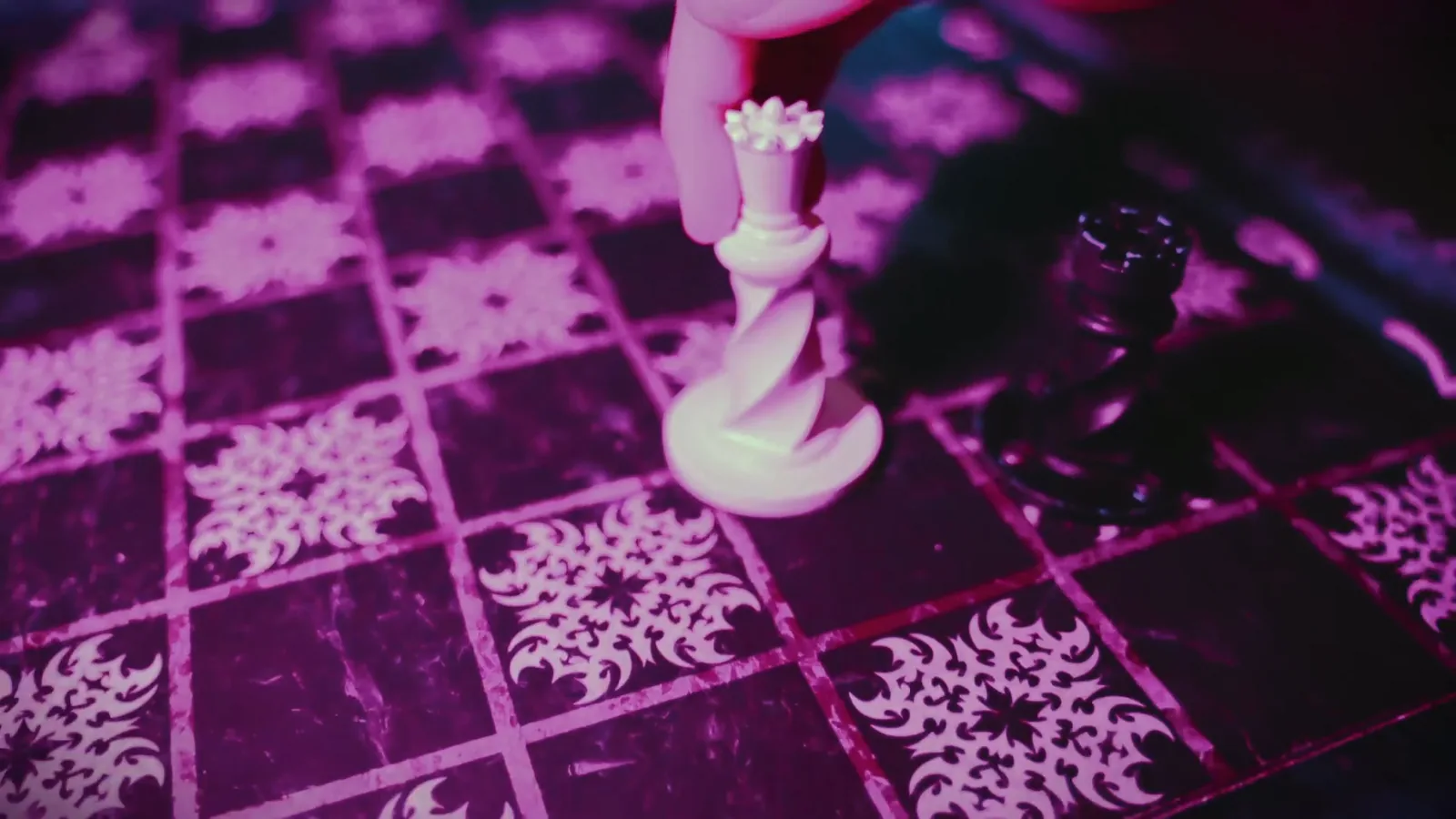A white chess piece on a patterned board in The Wizard's Chamber